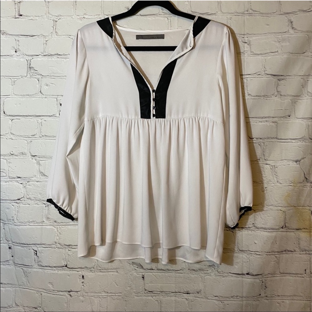 Zara Black and White Peplum Long Sleeve blouse